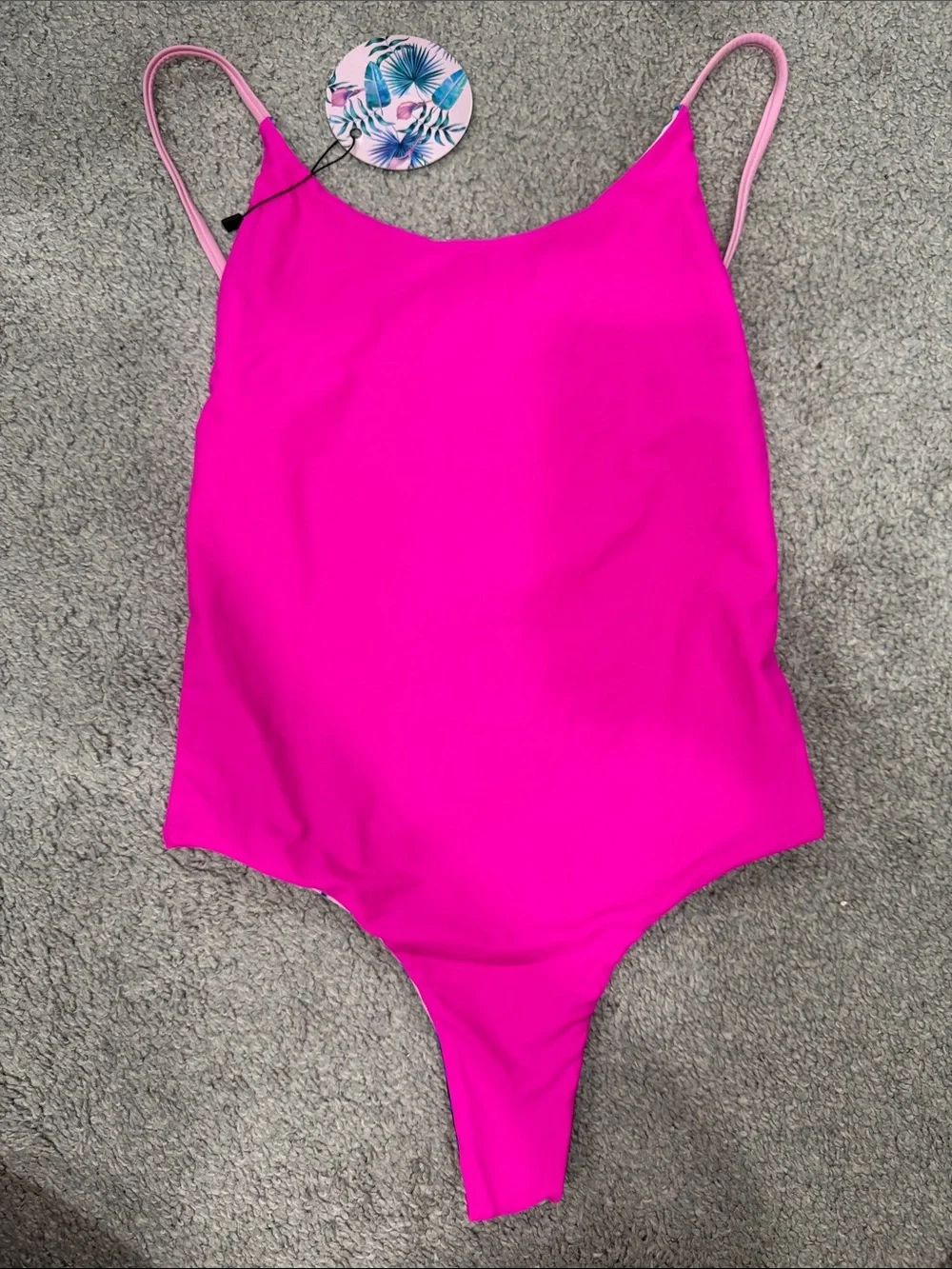 Roxy Pink One-Piece Swimsuit with Blue Tropical Leaf Design